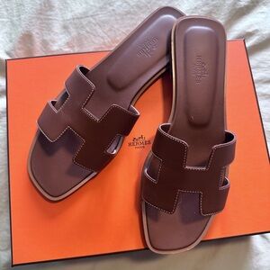 Hermes gold color Oran sandals in size 39. Practically new